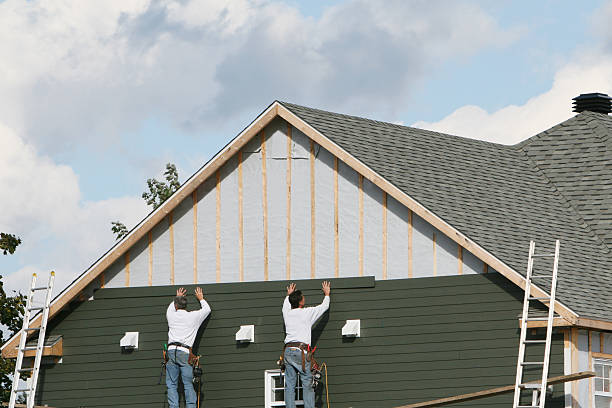 Professional Vinyl Siding technician working in Watertown, NY